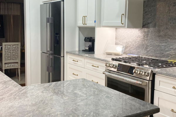 Kitchen remodel with slab countertop in Highland Park, TX