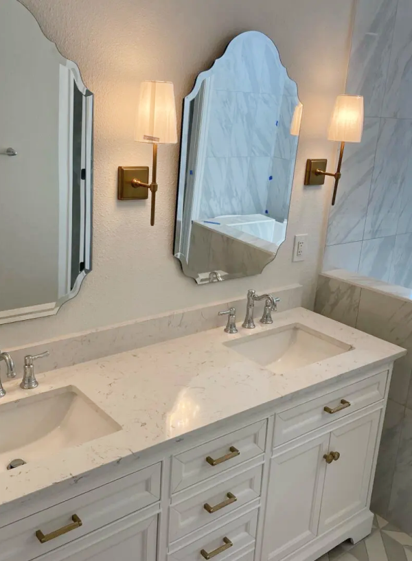 Bathroom remodel with double vanity and quartz countertop in University Park, TX